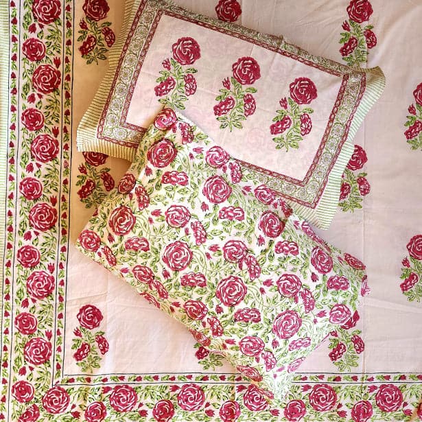 Pink Rose Print King Size Bedsheet: Ethically Crafted Elegance for Your Bedroom.